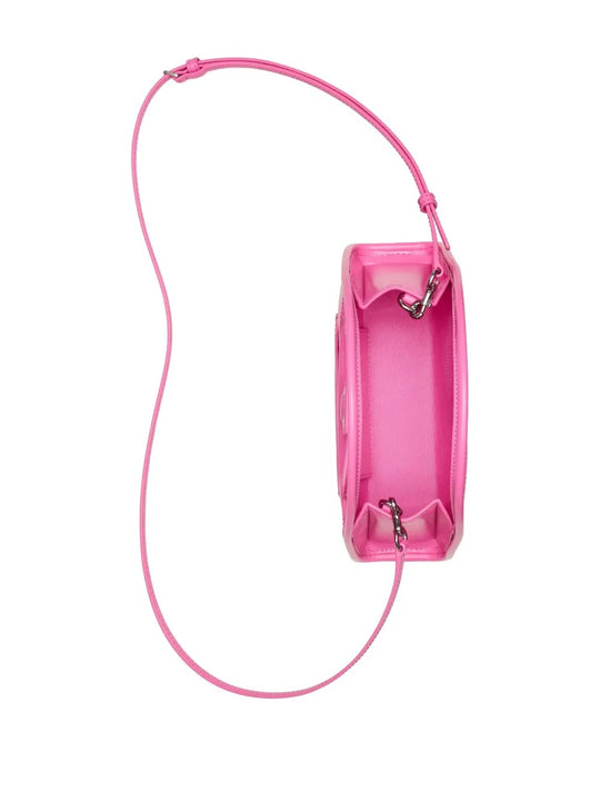 Close up of the pink bag, showing texture of the leather fabric