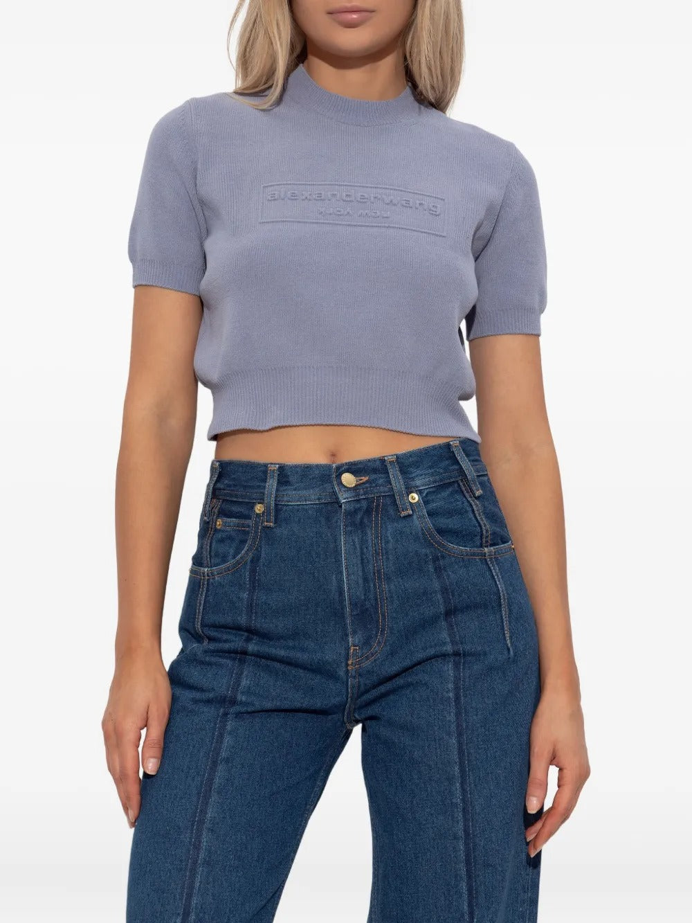 Purple t-shirt worn by a person, showing the shirt's fit