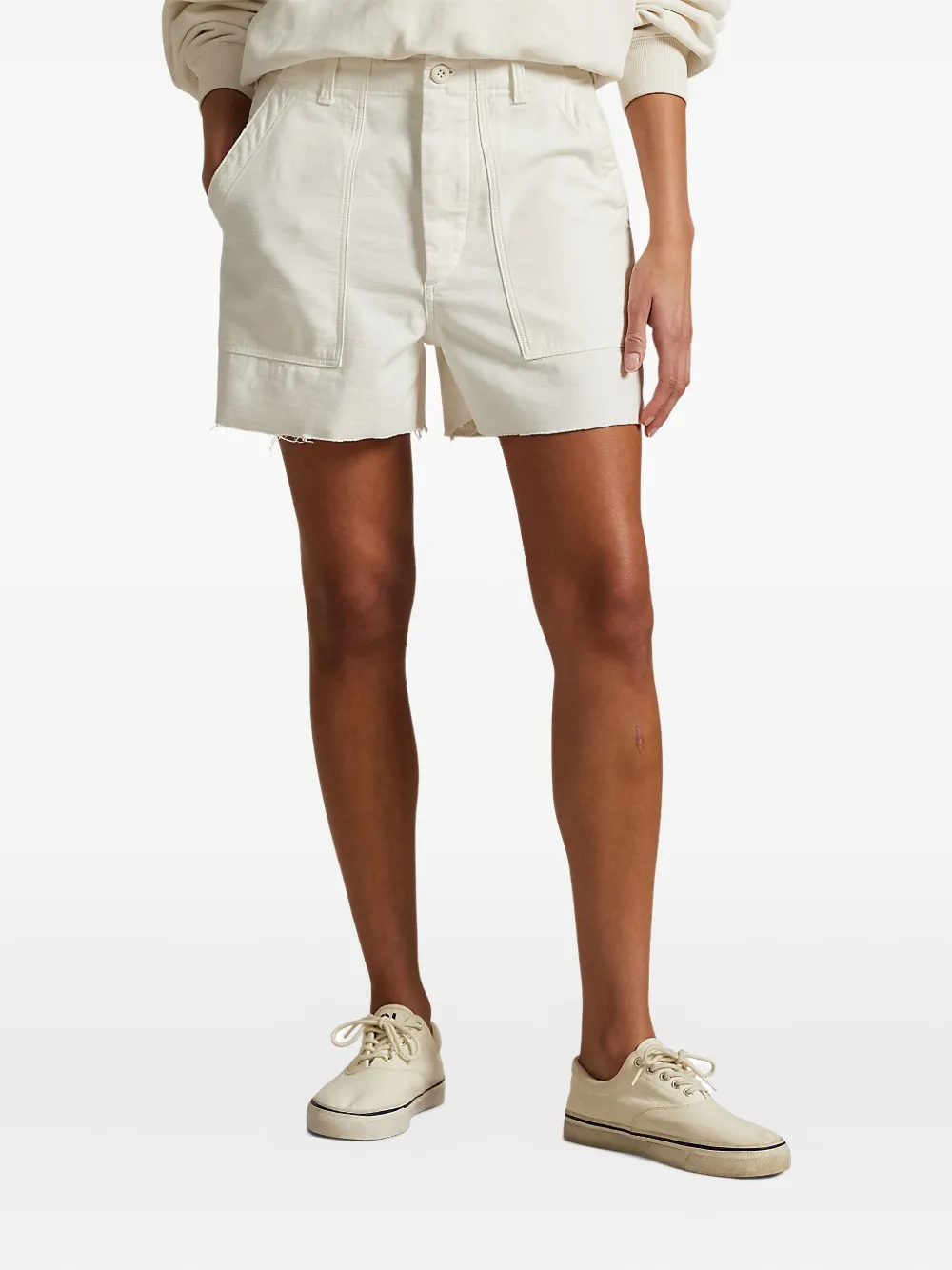 White short worn by a person, showing the short's fit
