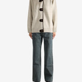 White knitwear, full body view