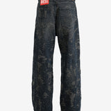 Black jeans worn by a person, showing the jeans' fit