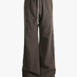 Brown pant worn by a person, showing the cotton fit