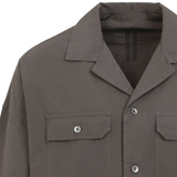 Close up of grey shirt, showing texture of the cotton fabric