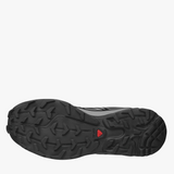 Close up of black sneakers, showing texture of the rubber fabric