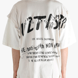 White t-shirt worn by a person, showing the t-shirt's fit