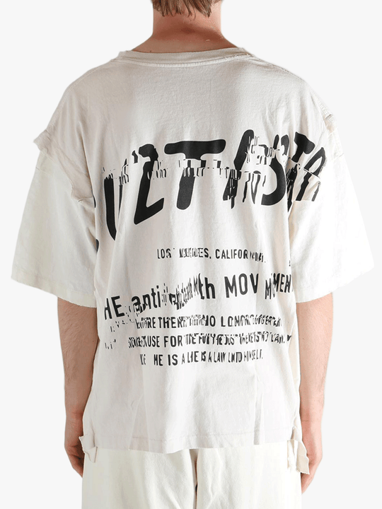 White t-shirt worn by a person, showing the t-shirt's fit