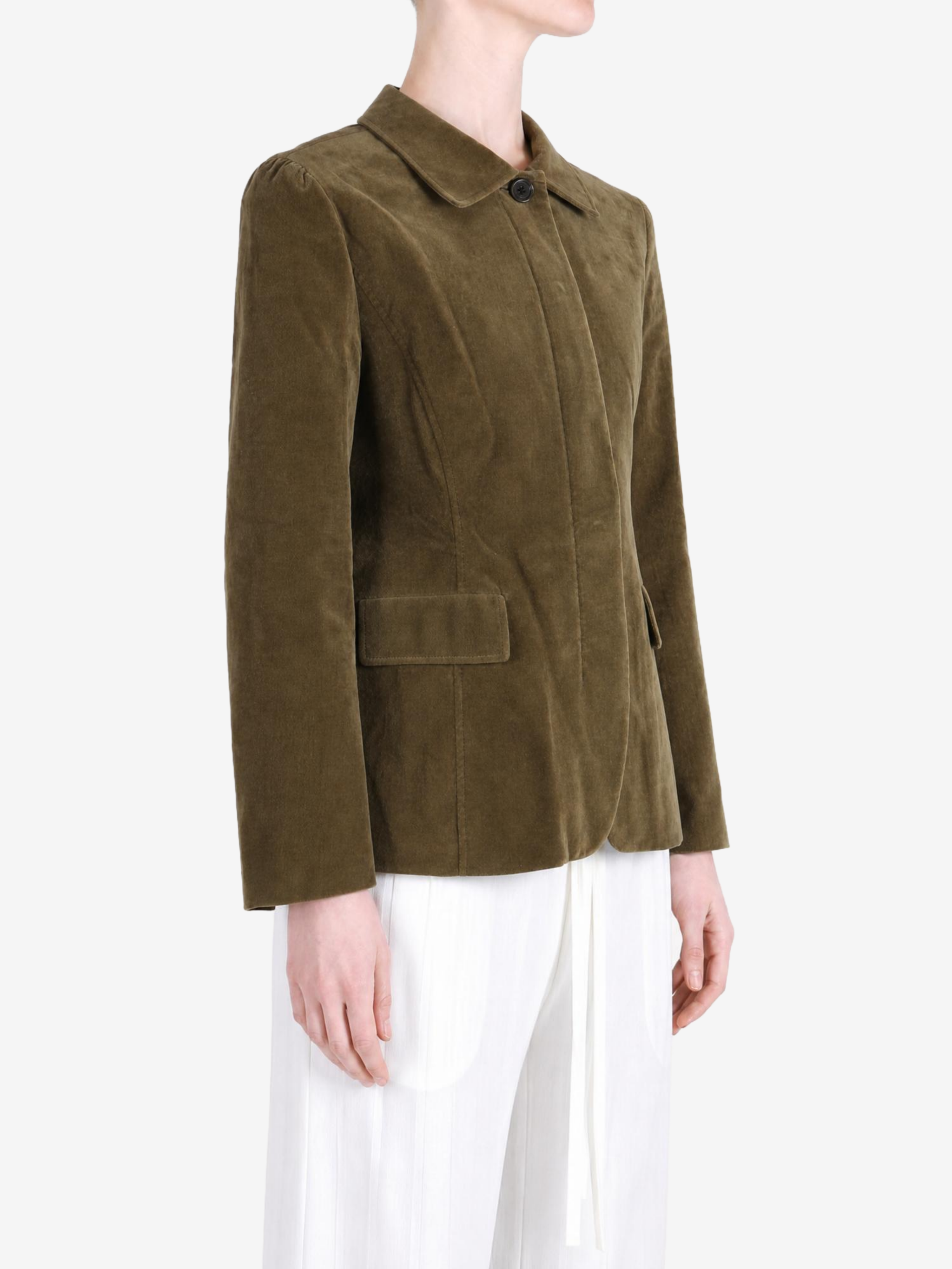 Brown jacket worn by a person, showing the jacket fit