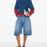 Blue shorts, full body view
