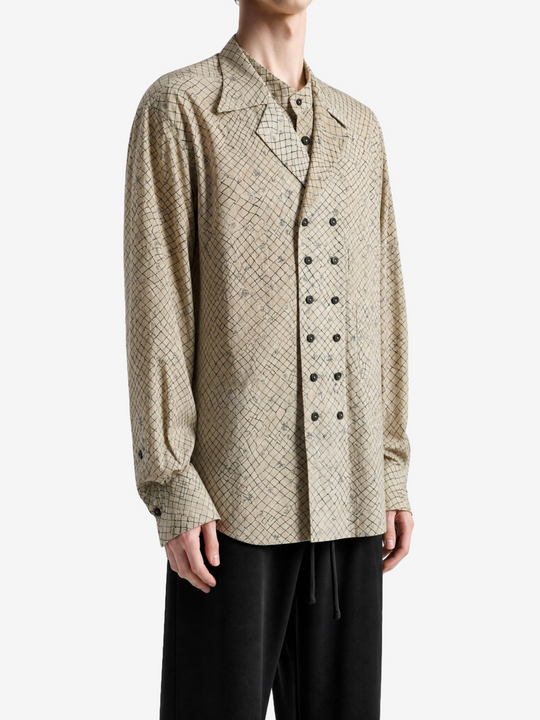 Tan shirt worn by a person, showing the shirt fit
