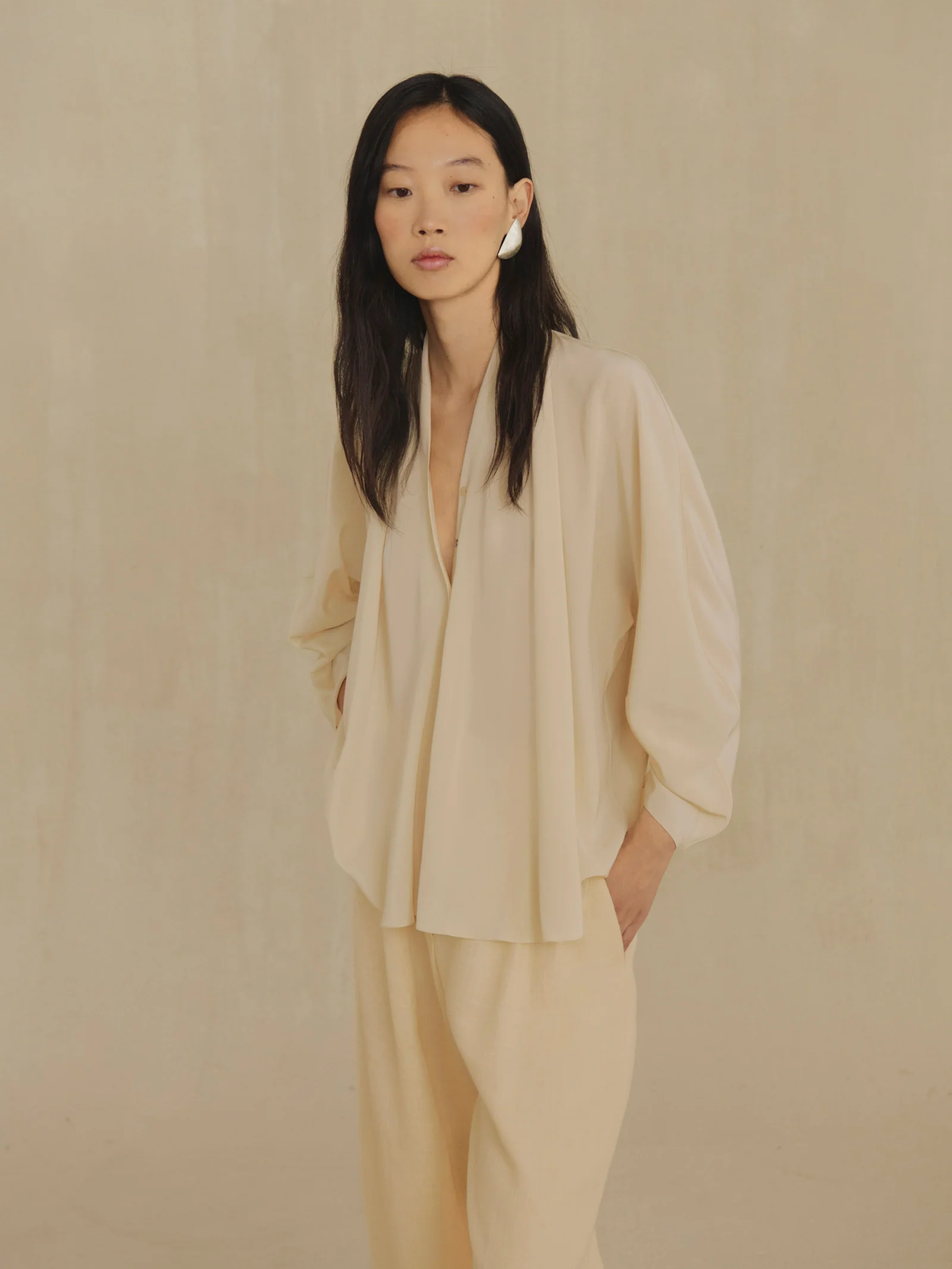 Tan shirt, full body view
