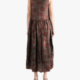 Red dress worn by a person, showing the loose fit.