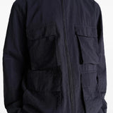 Close up of the black jacket, showing texture of the cotton fabric