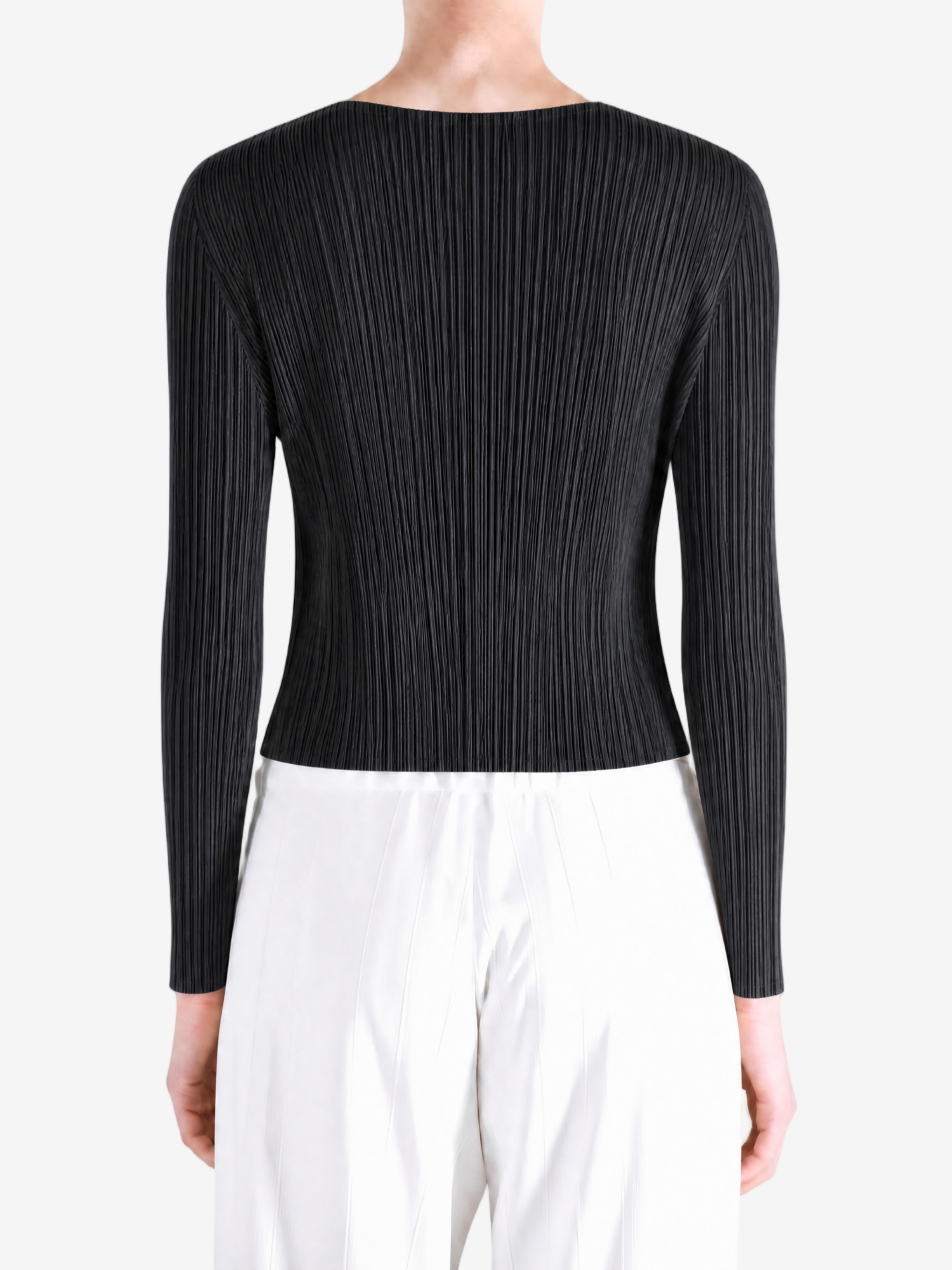 Black knitwear worn by a person, showing the knitwear fit