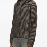 Brown jackets worn by a person, showing the jackets fit