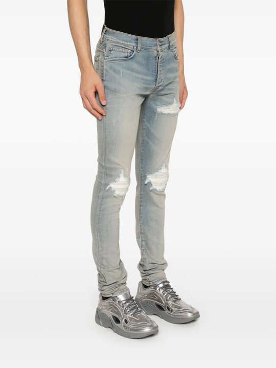 Blue pants worn by a person, showing the pants fit