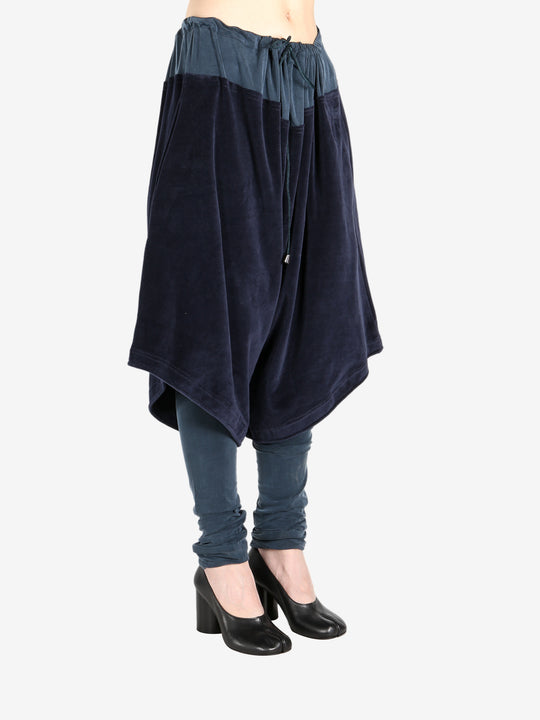 Navy trouser worn by a person, showing the trouser fit