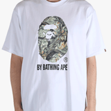 White t-shirt worn by a person, showing the t-shirt's fit