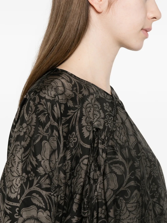 close up of black tops, showing texture of the viscose fabric 