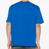 Blue T-shirt worn by a person, showing the shirt's fit