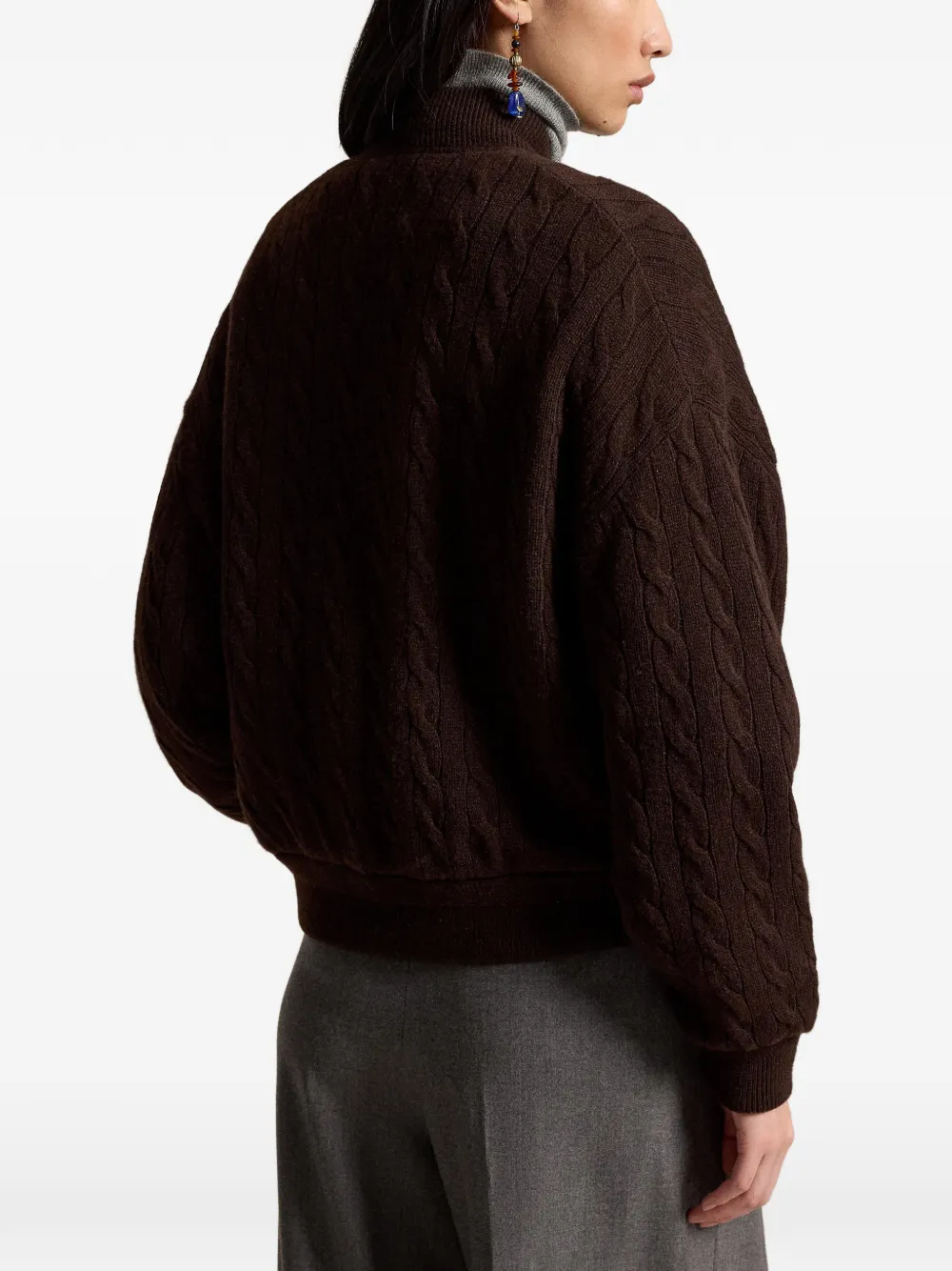 Brown jacket worn by a person, showing the jacket fit