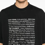 Close up of the black t-shirt, showing texture of the cotton fabric