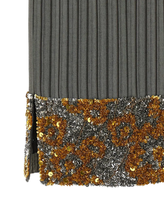 Close up of grey skirt, showing texture of the viscose fabric