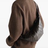 Brown bag worn by a person, showing the bag fit