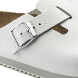 Close up of white sandals, showing the detial of buckle