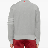 Grey jacket worn by a person, showing the jacket's fit