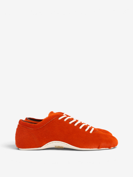 Orange shoes, side view