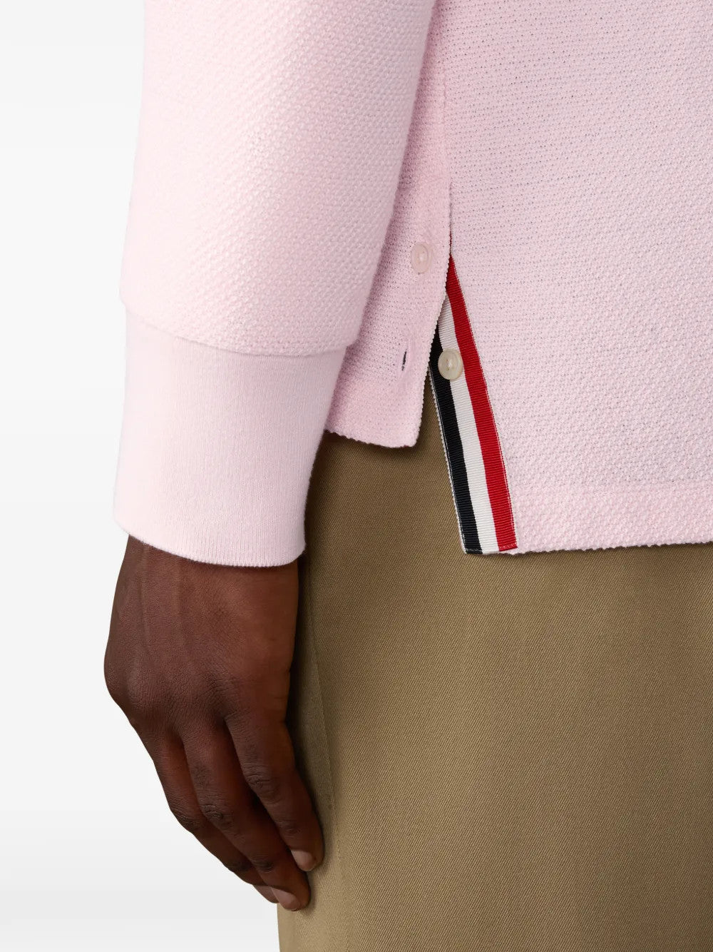 Pink t-shirt worn by a person, showing the t-shirt fit
