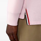 Pink t-shirt worn by a person, showing the t-shirt fit