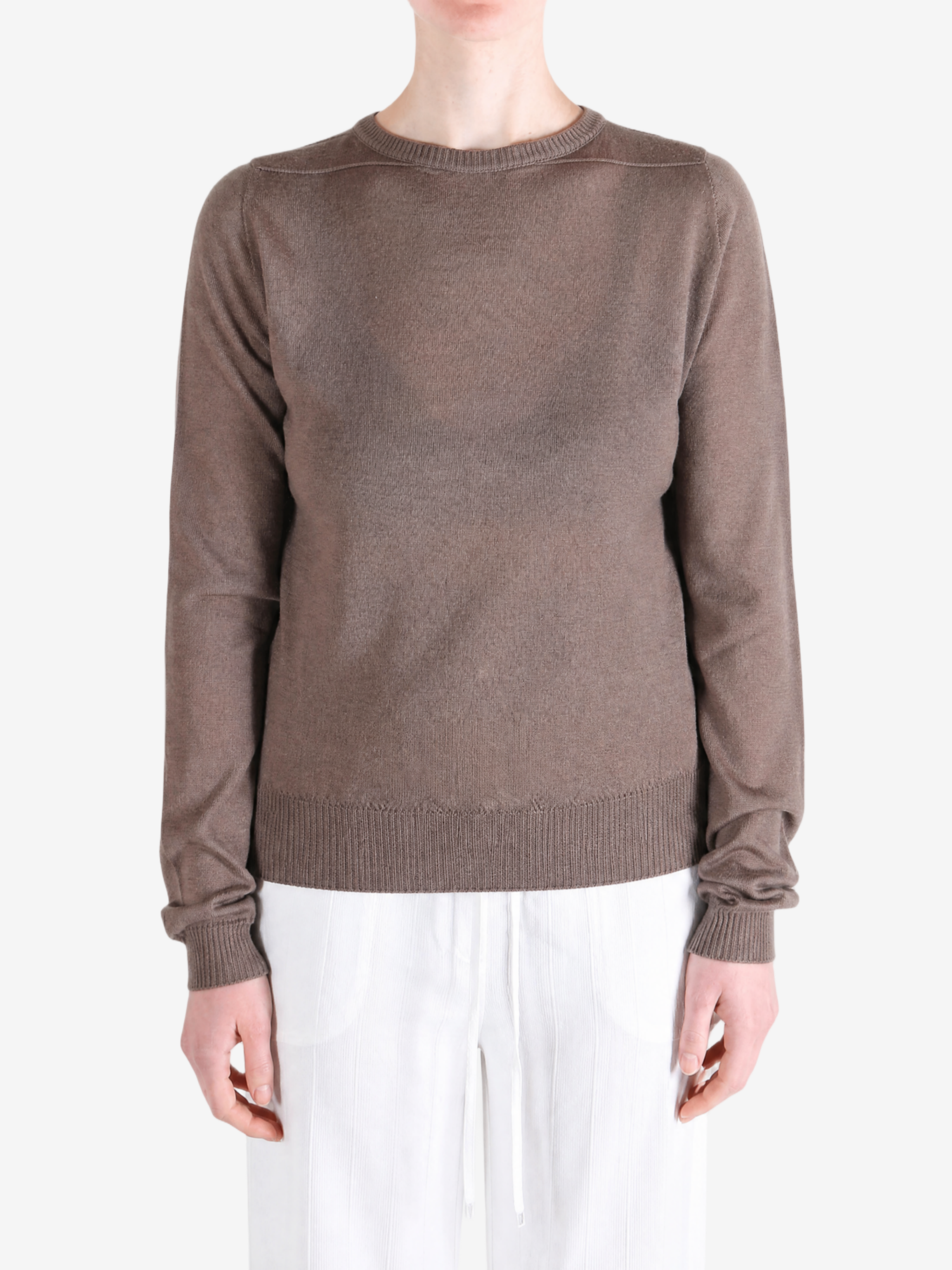 Brown top worn by a person, showing the top fit