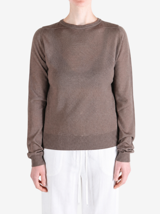 Brown top worn by a person, showing the top fit