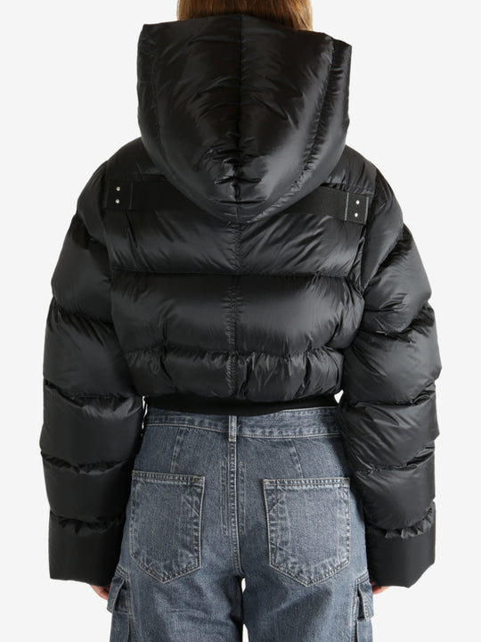 Black jacket worn by a person, showing the jacket fit