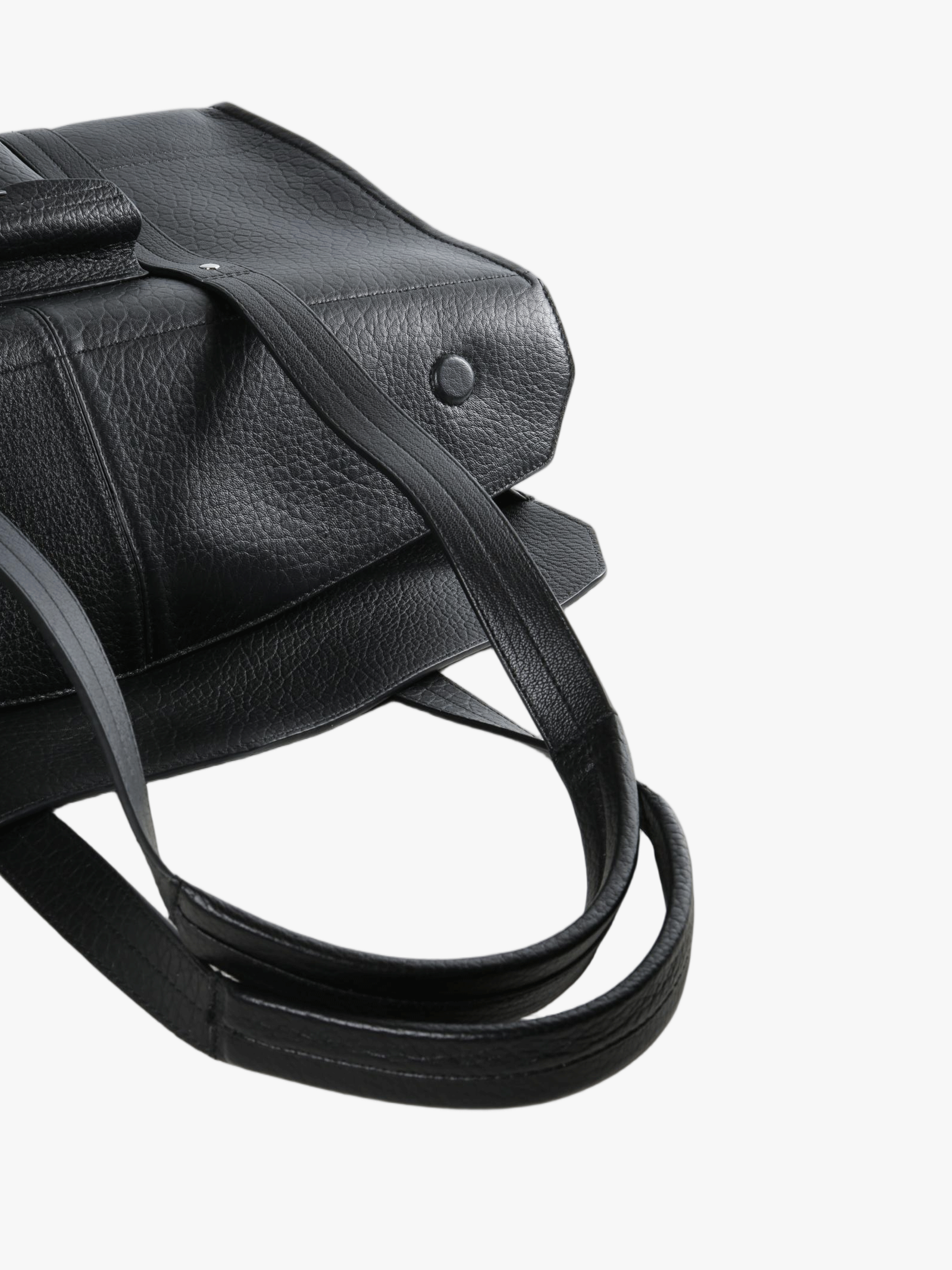 Close up of black bag, showing material of calf leather