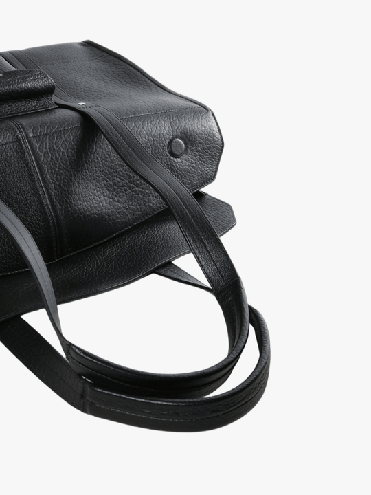 Close up of black bag, showing material of calf leather