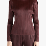 Burgundy shirt worn by a person, showing the shirt fit