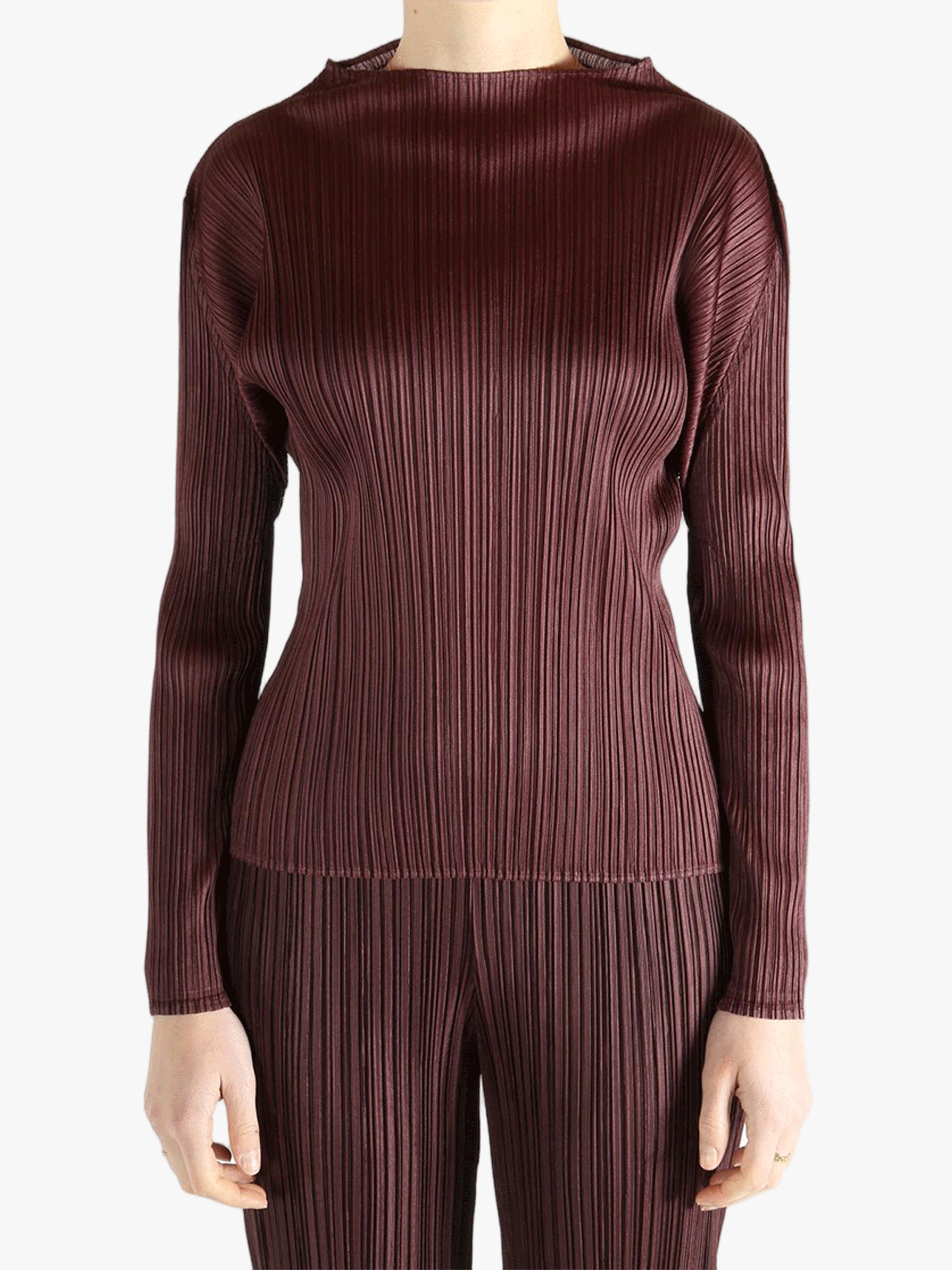 Burgundy shirt worn by a person, showing the shirt fit