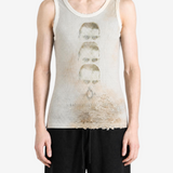Tan t-shirt worn by a person, showing the t-shirt fit