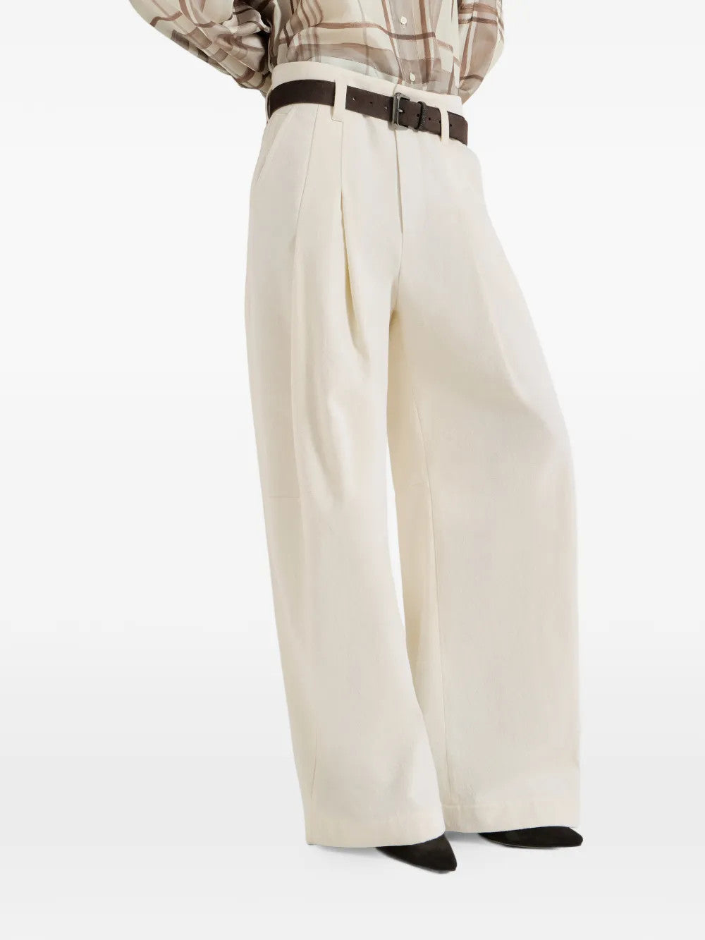Tan pants worn by a person, showing the pants fit