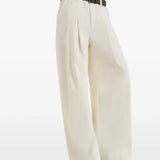 Tan pants worn by a person, showing the pants fit