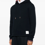 Navy hoodies worn by a person, showing the hoodies fit