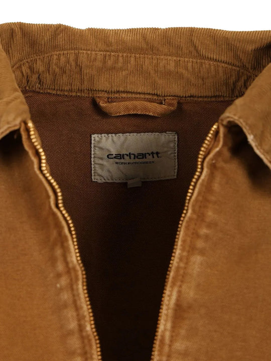 Close up of Brown jacket, showing texture of the 100% organic cotton made fabric