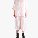 Light pink button-up shirt,full body view