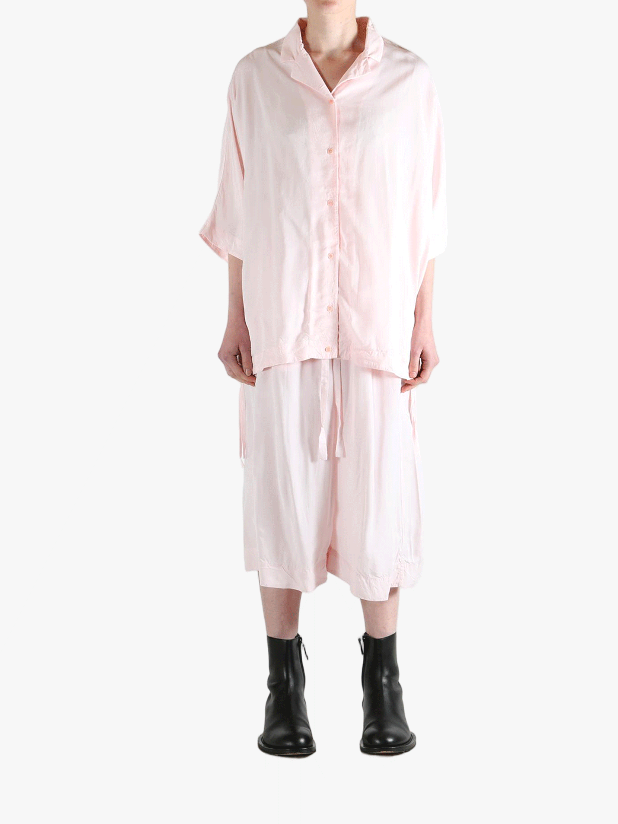 Light pink button-up shirt,full body view