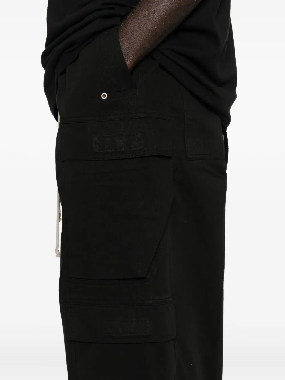 Close up of the black pants, showing texture of the cotton fabric