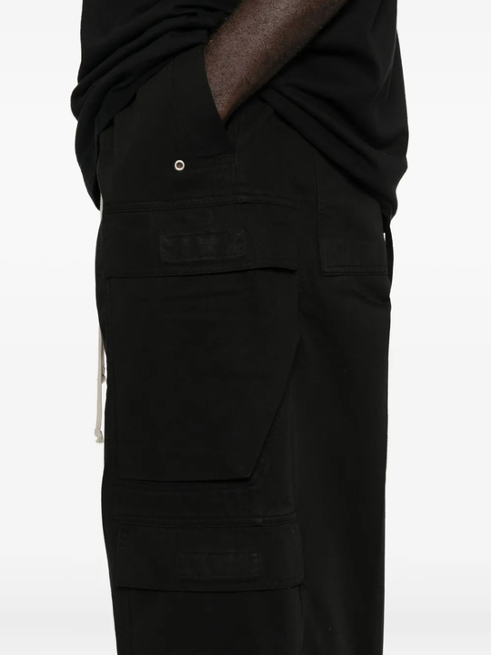 Close up of the black pants, showing texture of the cotton fabric