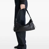 Brown bag  worn by a person, showing the bag 's fit