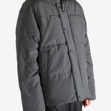 Grey jacket worn by a person, showing the jacket's fit